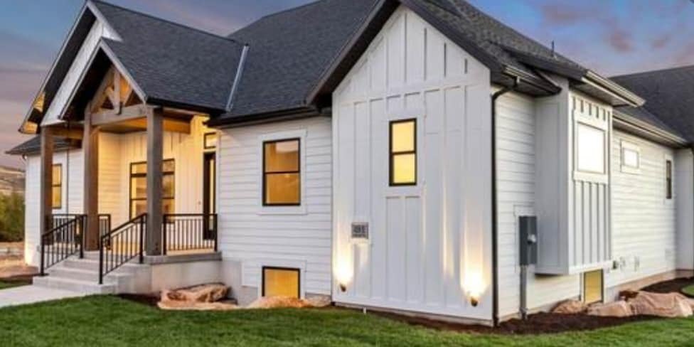 Chalk Creek white exterior with metal roof accents