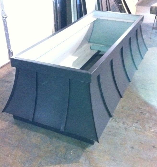Large chimney cap fabricated by Omega Metals